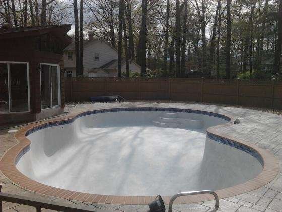 Concrete Pool Re-plastered with White Plaster and new Coping, Tile & Decking