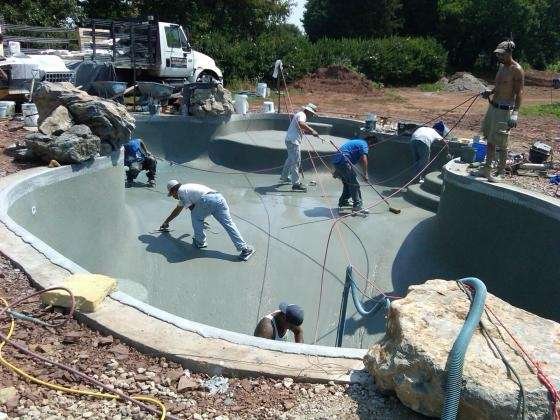 Plastering a pool with River Rok